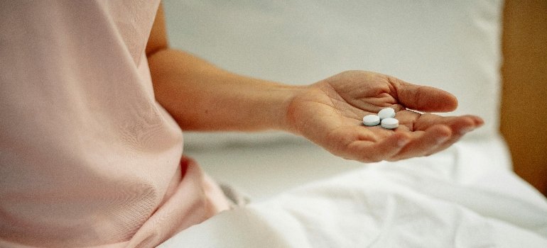 Hand with Medications